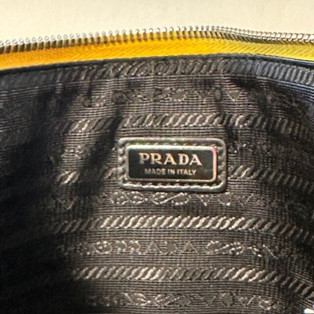 Prada Yellow Triangle Leather Clutch