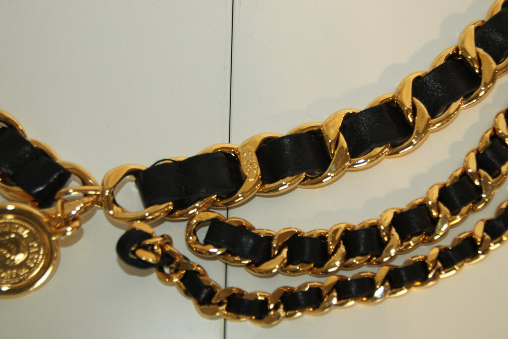 Vintage Chanel Three-Row Black Leather And Gold-Plated Chain Belt With A Medallion Charm - 90 CM